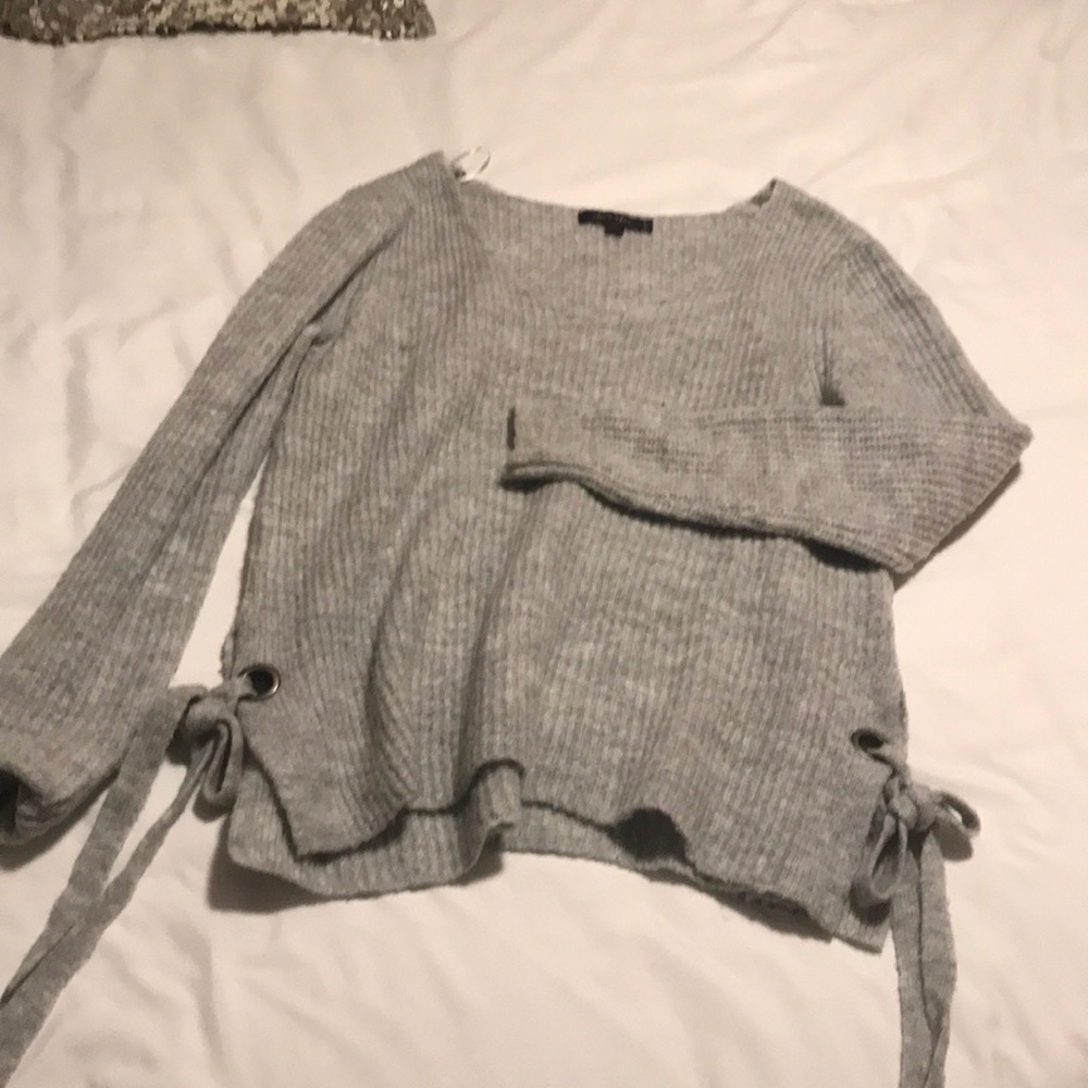 Side tie sweater